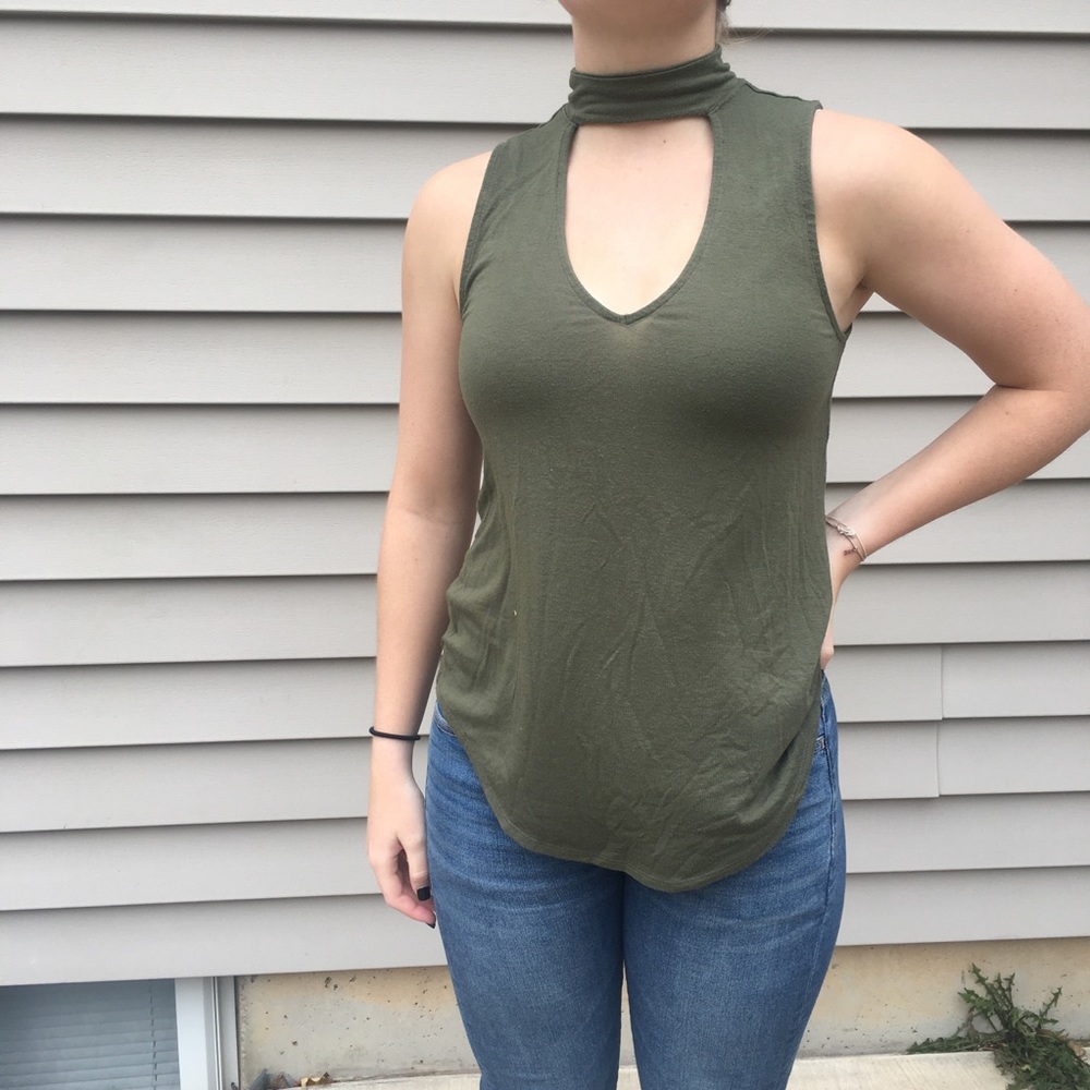 Green tank with open chest